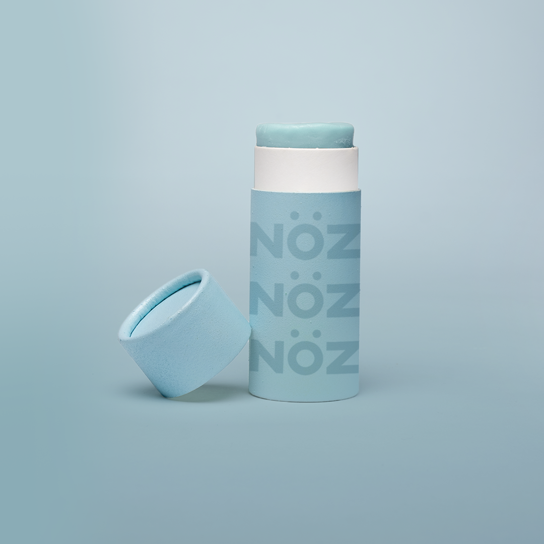 A full stand alone product shot of Nӧz Sunscreen in blue