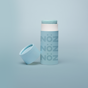 A full stand alone product shot of Nӧz Sunscreen in blue