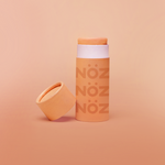 Load image into Gallery viewer, A full stand alone product shot of Nӧz Sunscreen in orange
